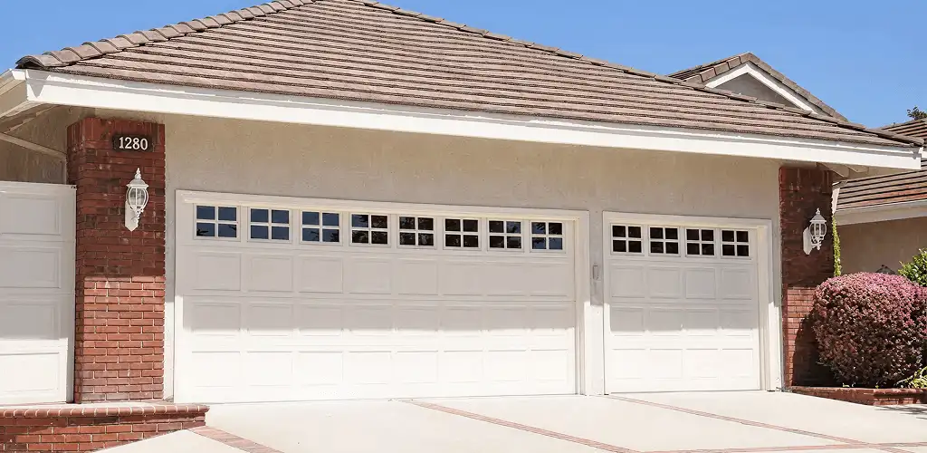 Residential garage door repair service for a double garage door in Columbus, GA