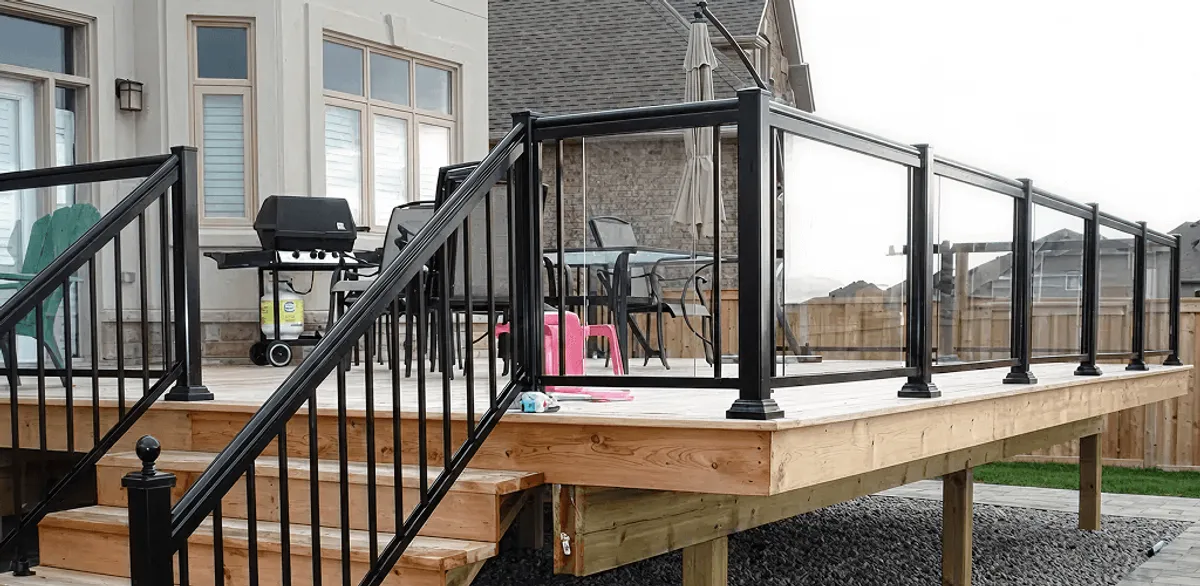 Handrail installation on a deck staircase for safety and code compliance in Columbus, GA